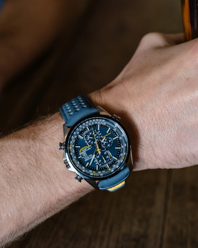 Citizen Mens Eco-Drive World Chronograph A-T Blue Angels Two-Tone Stainless Steel Case, Blue Polyurethane Coated Leather Strap, Blue Dial, WR 200M